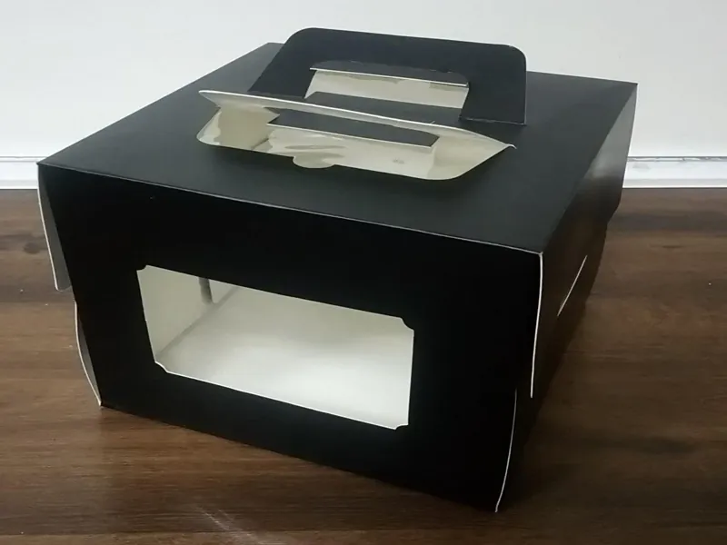 Hộp đựng bánh kem tròn màu đen sang trọng có quai xách