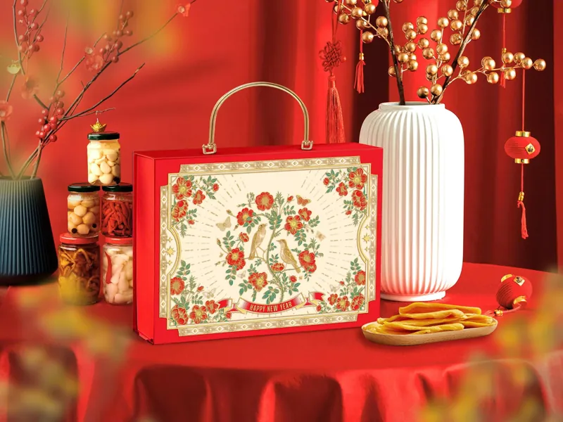 Hộp quà Tết Vân Hoa màu đỏ truyền thống với kỹ thuật ép kim và thúc nổi họa tiết hoa xuân tinh tế