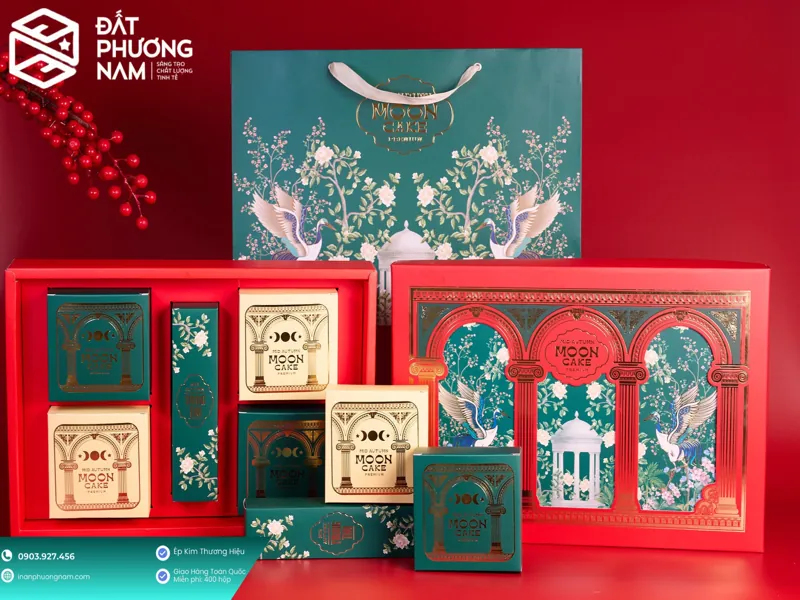 Hộp quà trung thu cao cấp màu xanh ngọc lục bảo kết hợp họa tiết kiến trúc tân cổ điển, xu hướng Eco-Luxury dẫn đầu 2026.