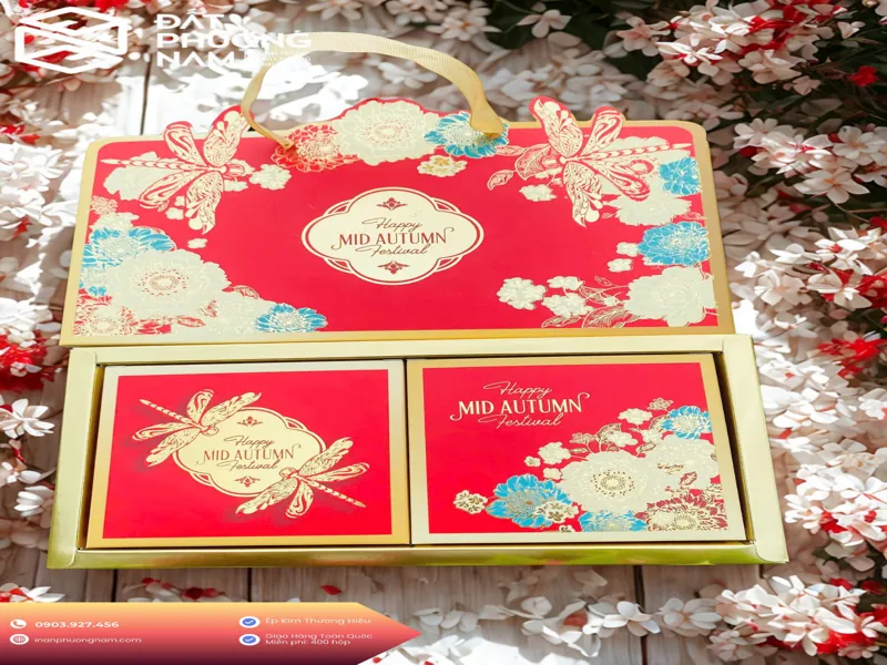 In hộp đựng bánh trung thu số lượng lớn kiểu dáng vali quai xách họa tiết chuồn chuồn