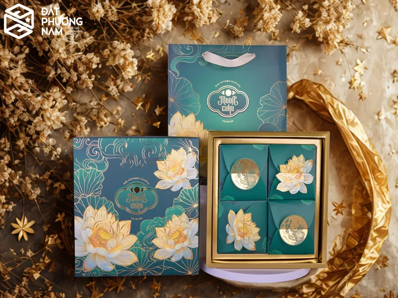 In logo lên hộp đựng bánh trung thu màu xanh lục bảo họa tiết hoa sen vàng thượng lưu